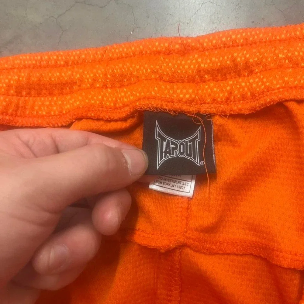 Vintage Y2K loose fit Tapout Mens‎ orange shorts skater